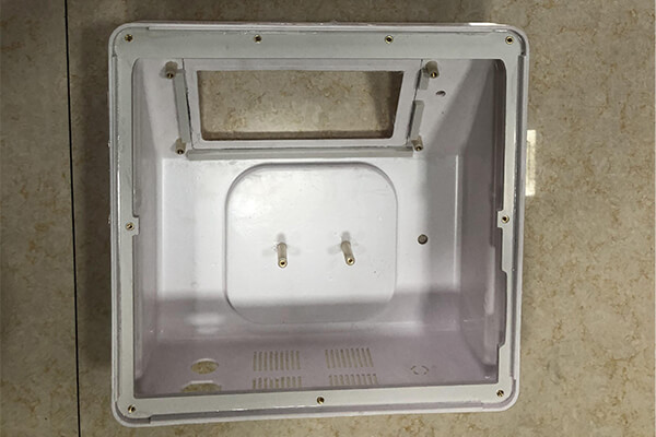 vacuum formed enclosure with nut